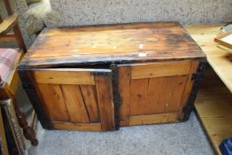 FAR EASTERN STAINED PINE AND METAL BOUND TWO-DOOR SIDE CABINET