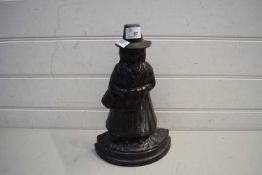 CAST IRON DOORSTOP FORMED AS A WELSH WOMAN