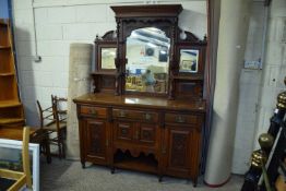 LATE VICTORIAN AMERICAN WALNUT MIRROR BACK SIDEBOARD, THE BASE WITH THREE DRAWERS AND FOUR DOORS,