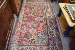 20TH CENTURY FLORAL DECORATED RUG, 240CM WIDE