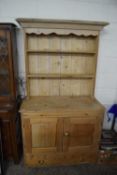 LATE 19TH/EARLY 20TH CENTURY PINE DRESSER, WITH SHELVED BACK OVER A BASE WITH PULL OUT SLIDE AND TWO