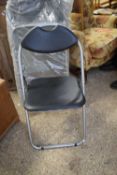 TWO FOLDING METAL FRAMED CHAIRS