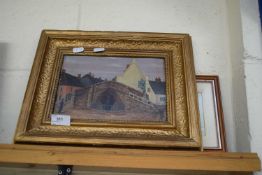 LATE 19TH/EARLY 20TH CENTURY STUDY OF A HOLY WELL, SET AMONGST A STREET SCENE, OIL ON BOARD, GILT