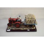 MODERN RESIN ORNAMENT OF A VINTAGE TRACTOR AND TRAILER