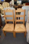 PAIR OF MODERN OAK FRAMED LADDERBACK KITCHEN CHAIRS