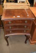 REPRODUCTION MAHOGANY VENEERED CONCAVE FRONT THREE DRAWER CHEST, 48CM WIDE