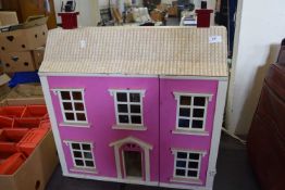 PINK AND WHITE PAINTED DOLLS HOUSE