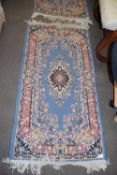 SMALL WOOL FLOOR RUG WITH BLUE CENTRAL PANEL WITH FLORAL BORDER, 140CM LONG