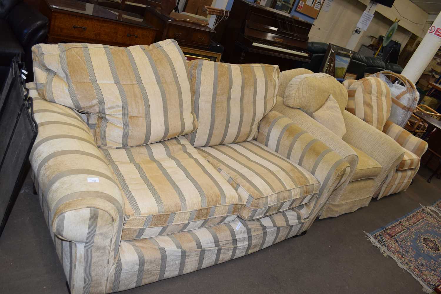 TWO-SEATER SOFA TOGETHER WITH A MATCHING ARMCHAIR AND A FURTHER PALE UPHOLSTERED ARMCHAIR (3)