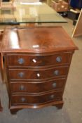 REPRODUCTION MAHOGANY VENEERED SERPENTINE FRONT FOUR DRAWER CHEST, 51CM WIDE