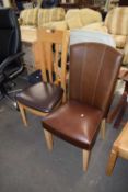 TWO MODERN LEATHER UPHOLSTERED DINING CHAIRS