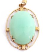 Modern oval green stone pendant in a yellow metal mount, 30mm x 24mm