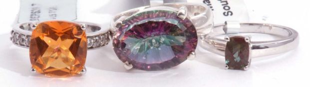 Mixed Lot: large mystic quartz dress ring, a colour change andesine ring, together with a chalcedony