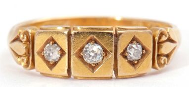 Victorian 18ct gold and diamond three stone ring, a three sectional panel design, each centring an