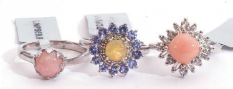 Mixed Lot: modern pink opal ring, an Ethiopian opal, tanzanite and diamond cluster ring, together