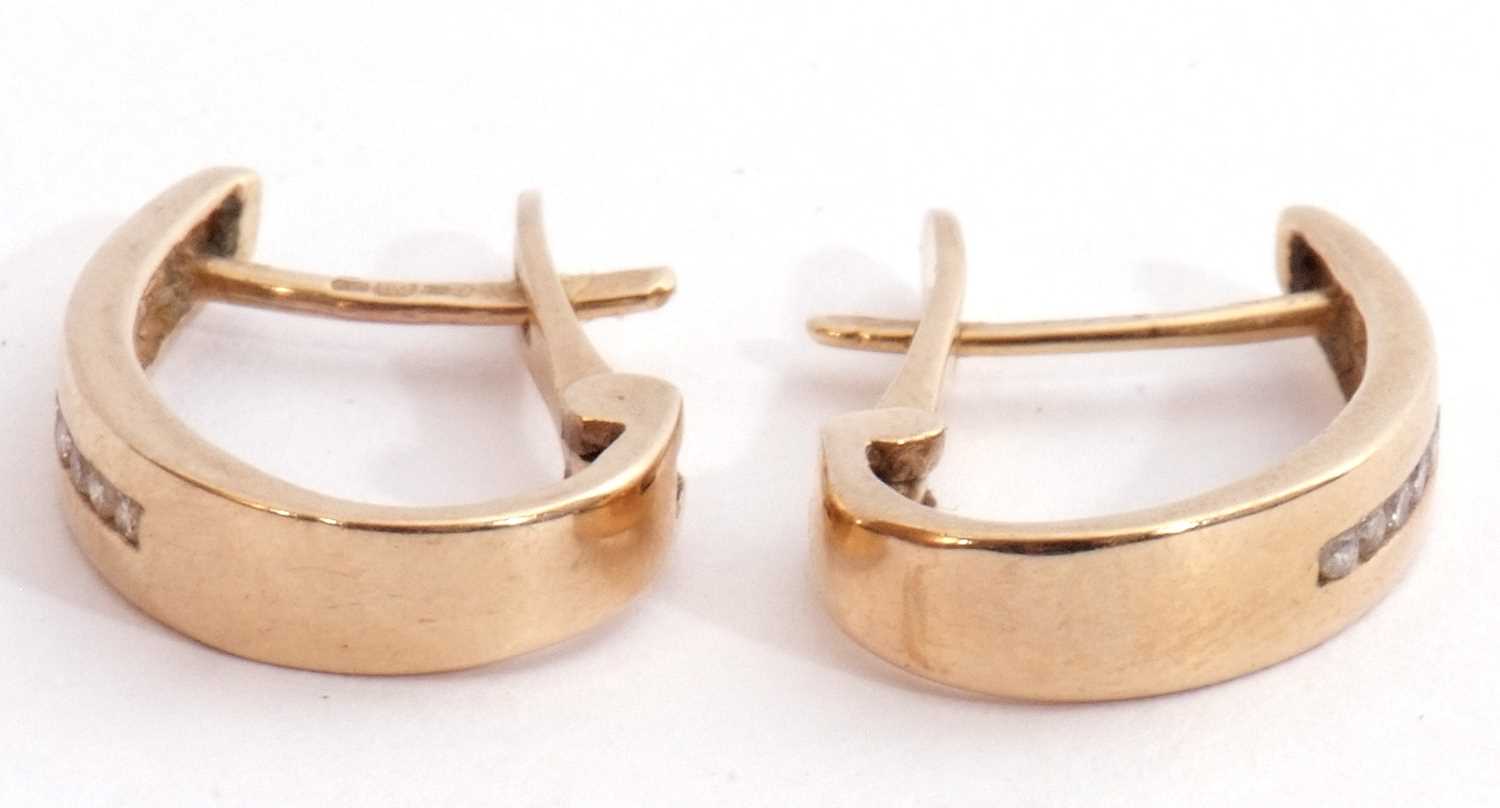 Pair of 10k stamped diamond set hoop earrings, a plain polished design, each channel set with 9 - Image 4 of 5