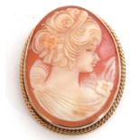 Cameo shell brooch depicting a profile of a lady, 35 x 30mm, framed in a 9ct gold mount