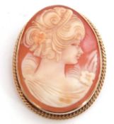 Cameo shell brooch depicting a profile of a lady, 35 x 30mm, framed in a 9ct gold mount