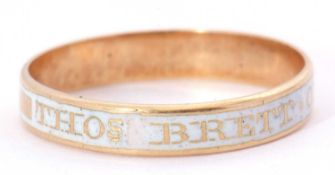 Antique mourning ring, a high grade yellow metal band with white enamel decoration with the