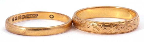 Mixed lot: two 22ct gold wedding rings, one with a chased and engraved design, together with a plain