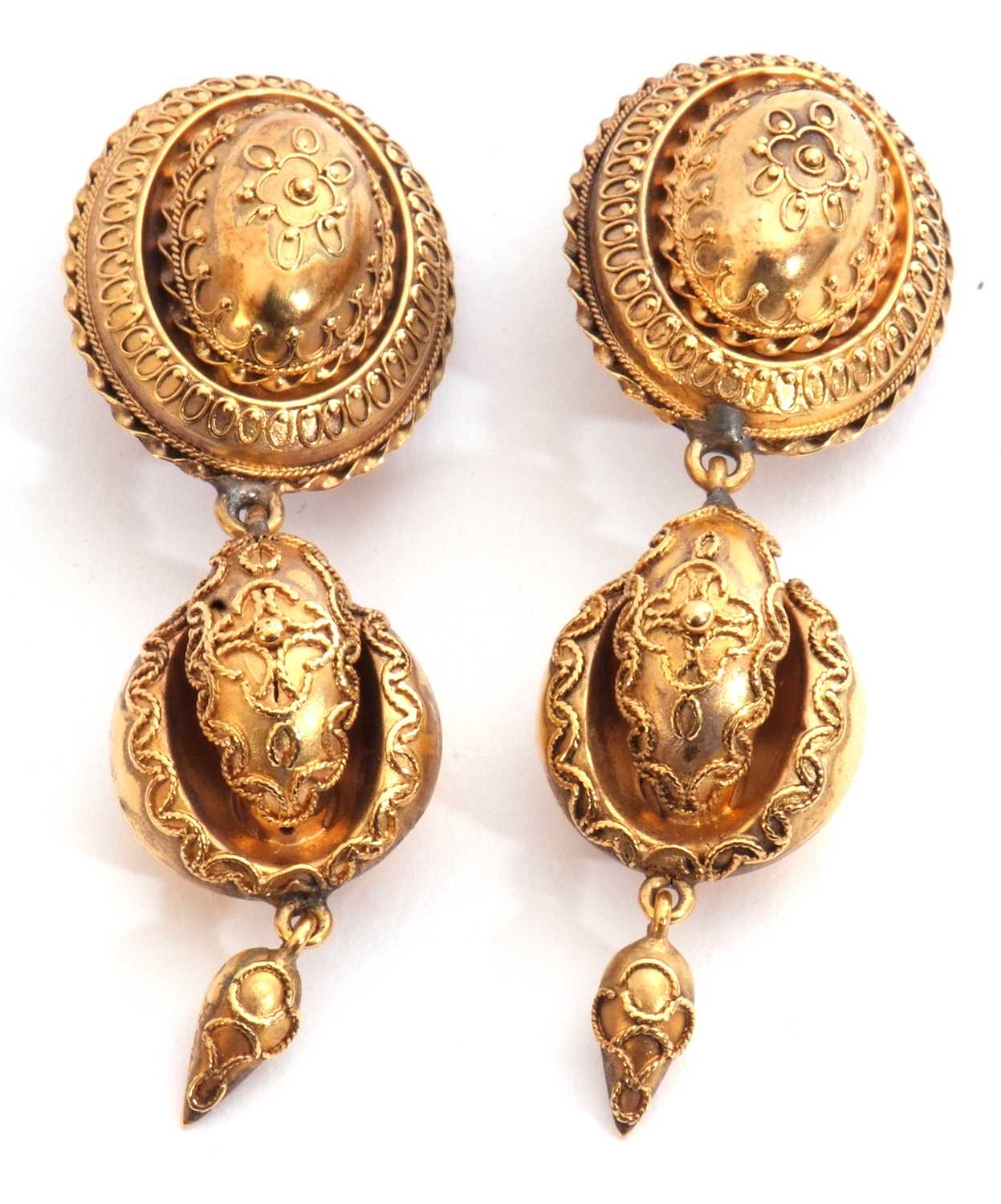 Pair of Victorian high grade yellow metal pendant earrings in Etruscan style, typically decorated