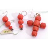 Antique coral drum beads cross pendant, together with a pair of graduated coral bead earrings (2)