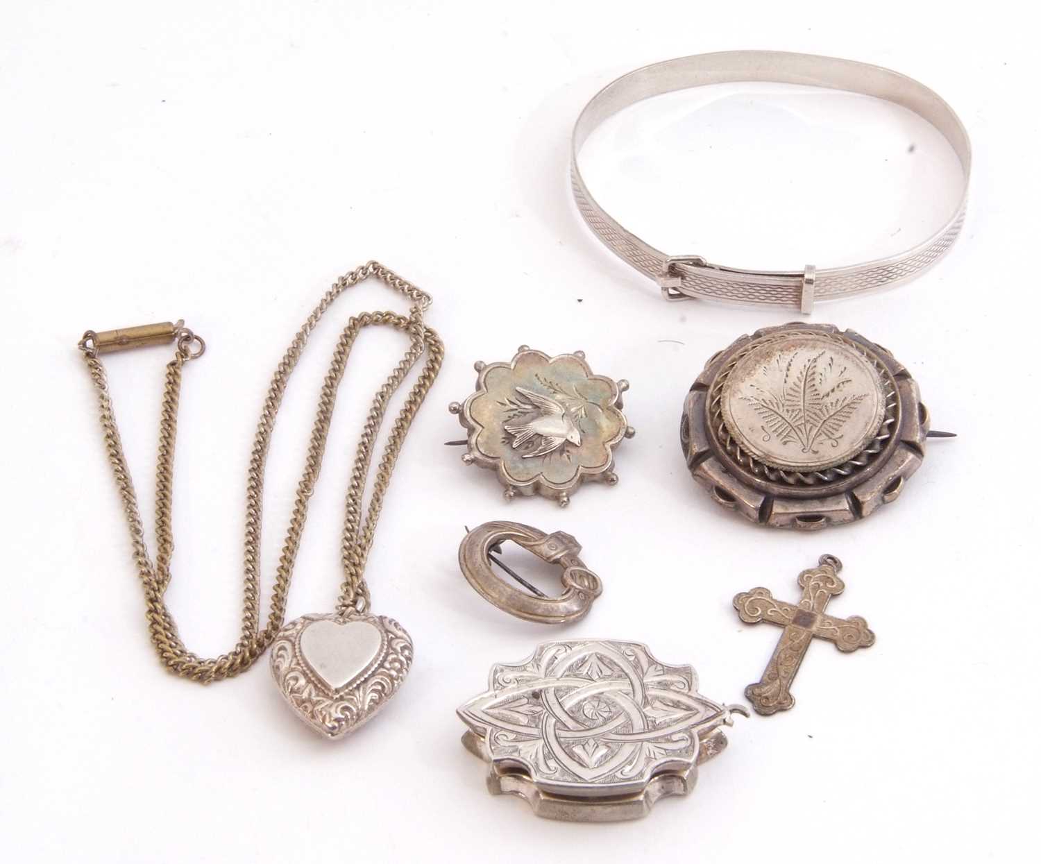 Mixed Lot: sterling stamped bracelet, a white metal heart locket, two brooches etc