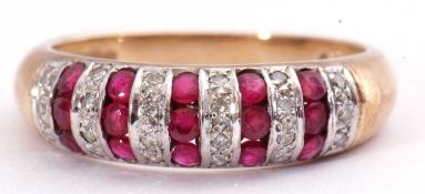 Modern 9ct gold and ruby ring, a design featuring groups of three small round cut rubies alternate