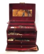 Red leatherette travelling jewellery case to include fob watch, earrings, necklace etc