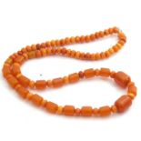 Amber bead necklace, a single row of butterscotch coloured graduated beads, drum and round shape,