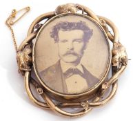 Victorian brooch, a sepia print depicting a one-eyed gentleman in an ornate scrolled gilt metal