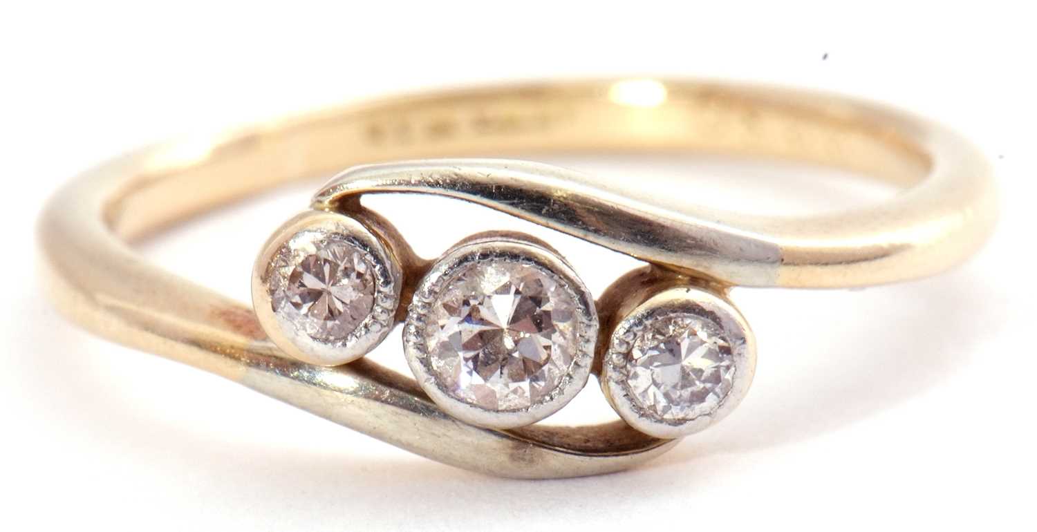 Three stone diamond cross over ring, a row of three graduated old brilliant cut diamonds, each in - Image 2 of 7