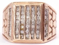 375 stamped large dress ring, the rectangular panel multi set with cubic zirconia stones, raised