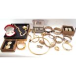 Box of costume jewellery to include bracelets, brooches etc