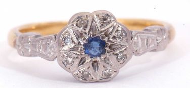 Sapphire and diamond set cluster ring, the centre round sapphire surrounded by small single cut