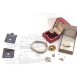 Mixed Lot: two certificated cubic zirconia stones, two large dress rings, one marked 'Dior', a