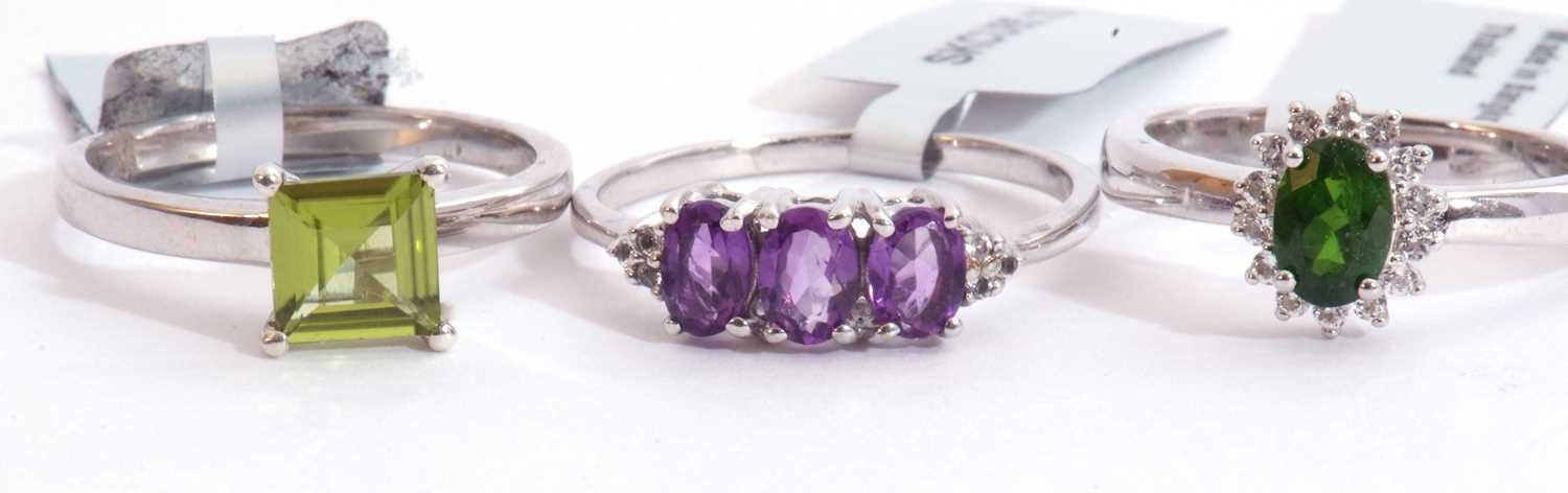 Mixed Lot: Changbai peridot ring, a Zambian amethyst and white topaz ring, together with a chrome - Image 2 of 2
