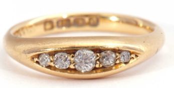 Antique five stone diamond ring of boat shape, set with five graduated old round cut diamonds, 0.