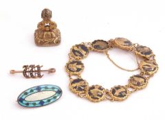 Mixed Lot: Victorian gilt metal seal, a yellow metal pin brooch centring a seed pearl set