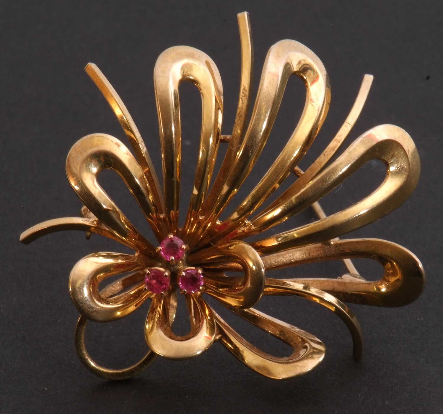 9ct gold and ruby spray brooch, open work design highlighted with three small round rubies, 7gms g/