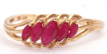 Modern 18ct gold and synthetic ruby ring featuring five graduated marquis shaped rubies, angula