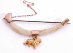 Antique bone and gold decorated bracelet, the curved shape bone capped with yellow metal fittings,