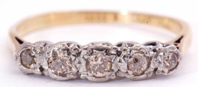 Diamond five stone ring featuring five graduated brilliant cut diamonds, all in illusion settings,