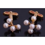 Cased pair of 9ct gold and cultured pearl cuff links, hallmarked 9ct gold, swivel fittings, (one