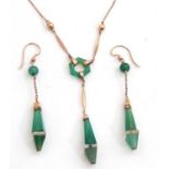 Art Deco green and white glass drop necklace of lantern style, faceted and plain polished beads,