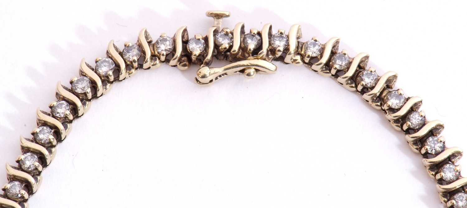 Diamond line bracelet featuring 49 small single cut diamonds set between S-bar articulated links, - Image 2 of 6