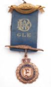 Vintage Masonic 9ct gold jewel 'Justice, Truth, Philanthropy', the ribbon marked with G.L.E.,