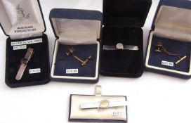 Mixed Lot: three white metal tie clips and two gilt metal tie pins (5)