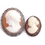 Mixed Lot: two cameo brooches depicting classical ladies in profile, both in white metal frames (2)