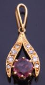 Modern diamond and pink stone set pendant, unmarked but tested for 18ct gold